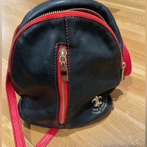 Black Red Genuine Italian Leather mini backpack/crossbody. Excellent condition.